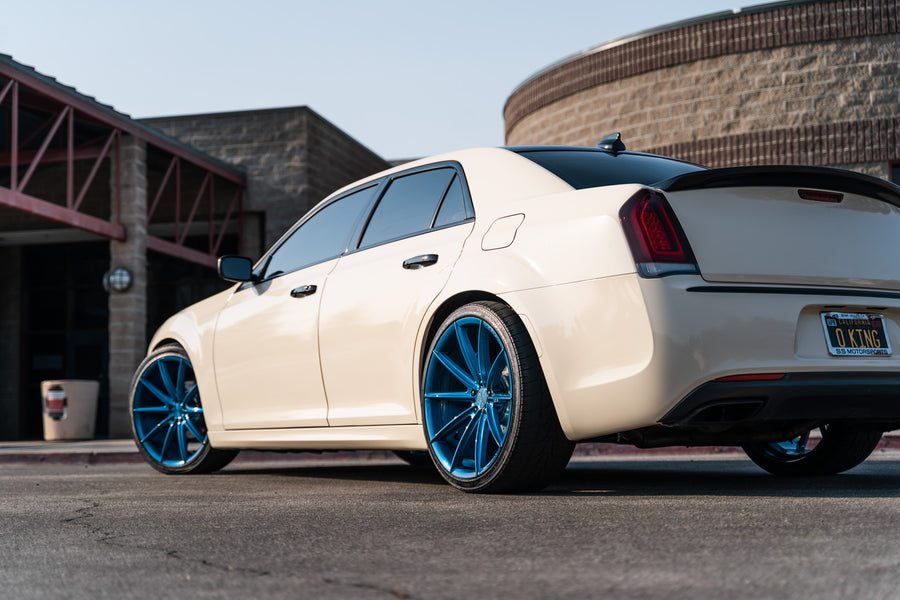 A 2018 Chrysler 300 on 22 Inch Blaque Diamond BD-11 Brushed Blue Wheels