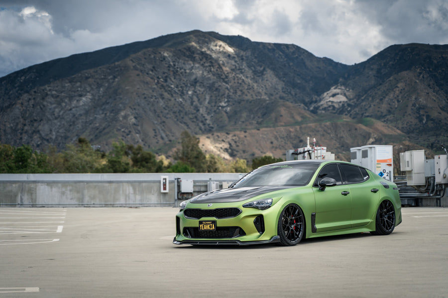 A 2019 Bagged Kia Stinger GT on 20 Inch Blaque Diamond BD-F18 Gloss Black Wheels