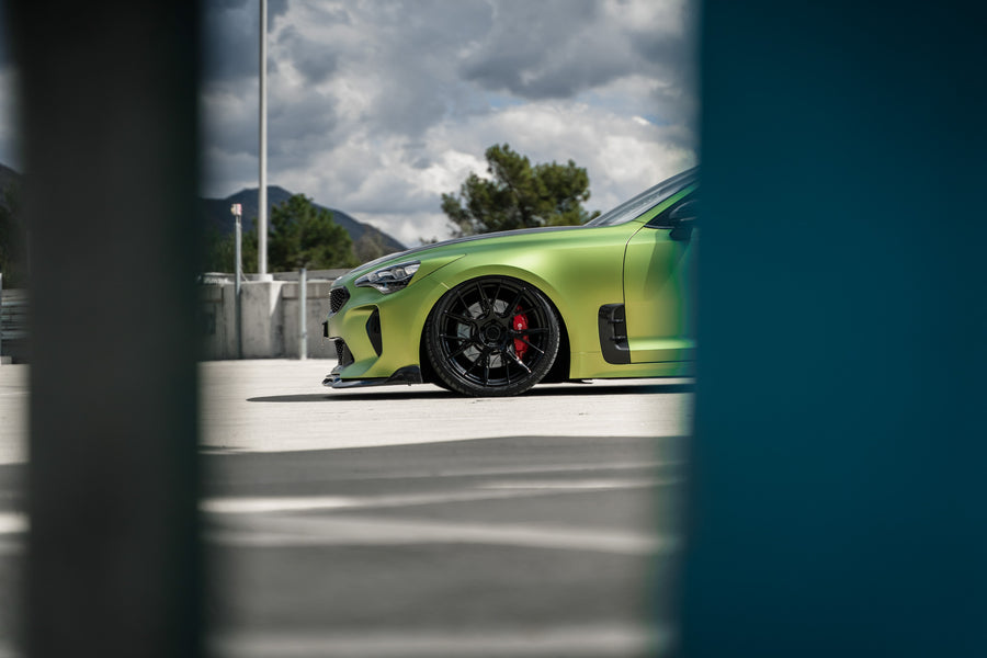 A 2019 Bagged Kia Stinger GT on 20 Inch Blaque Diamond BD-F18 Gloss Black Wheels