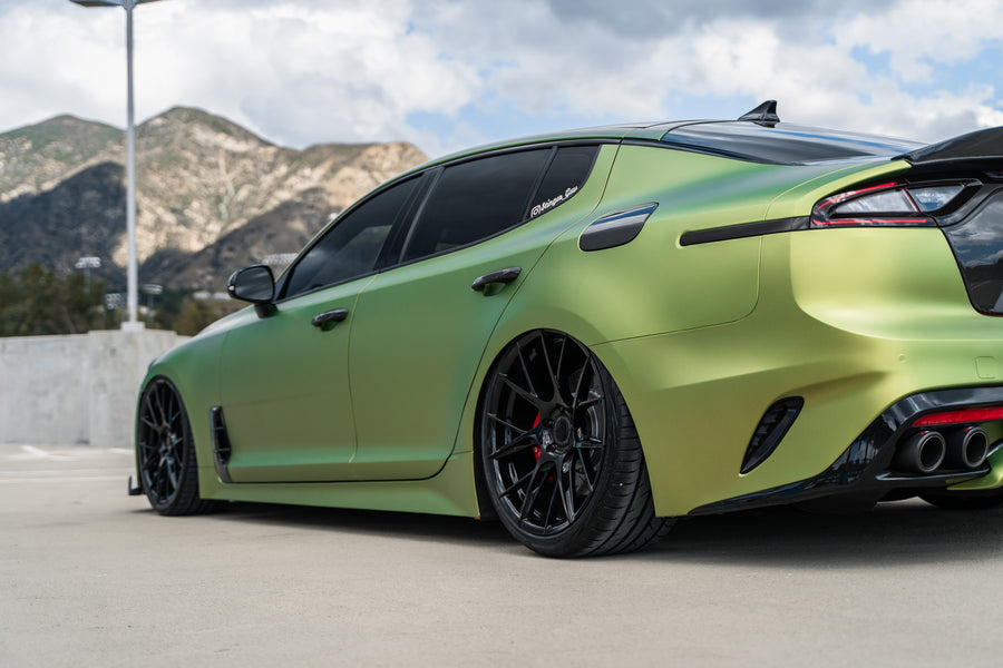 A 2019 Bagged Kia Stinger GT on 20 Inch Blaque Diamond BD-F18 Gloss Black Wheels