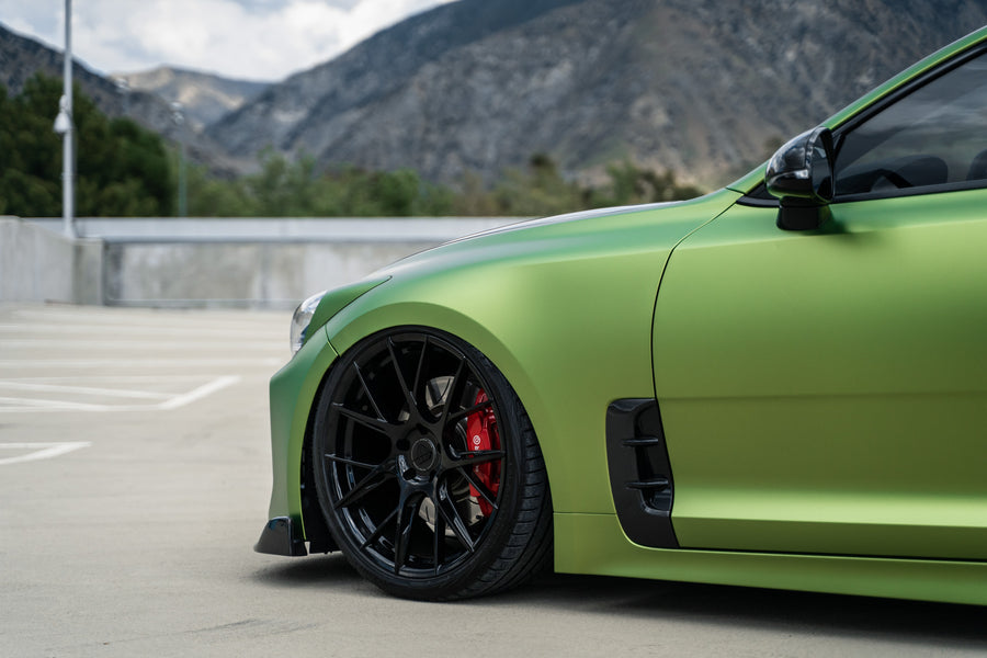 A 2019 Bagged Kia Stinger GT on 20 Inch Blaque Diamond BD-F18 Gloss Black Wheels