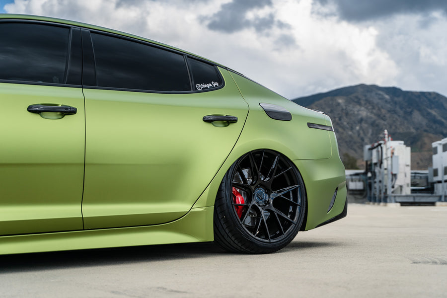 A 2019 Bagged Kia Stinger GT on 20 Inch Blaque Diamond BD-F18 Gloss Black Wheels