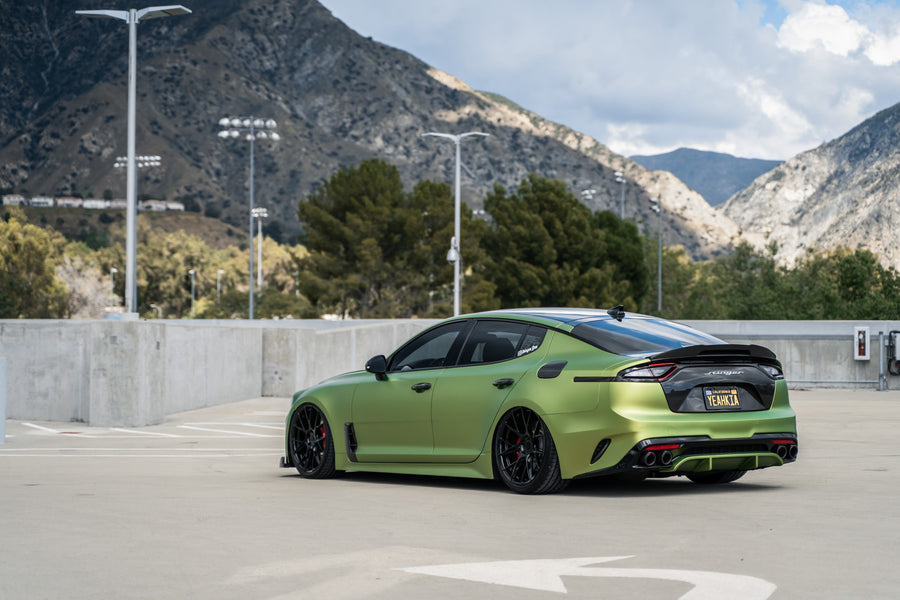A 2019 Bagged Kia Stinger GT on 20 Inch Blaque Diamond BD-F18 Gloss Black Wheels