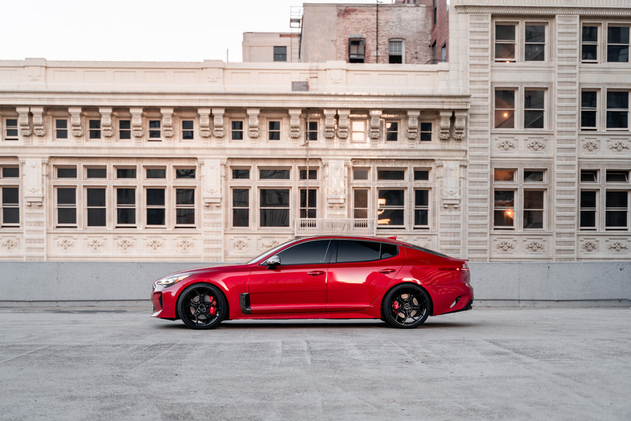A 2019 Kia Stinger GT on 20 Inch Blaque Diamond BD-F25 Gloss Black Wheels