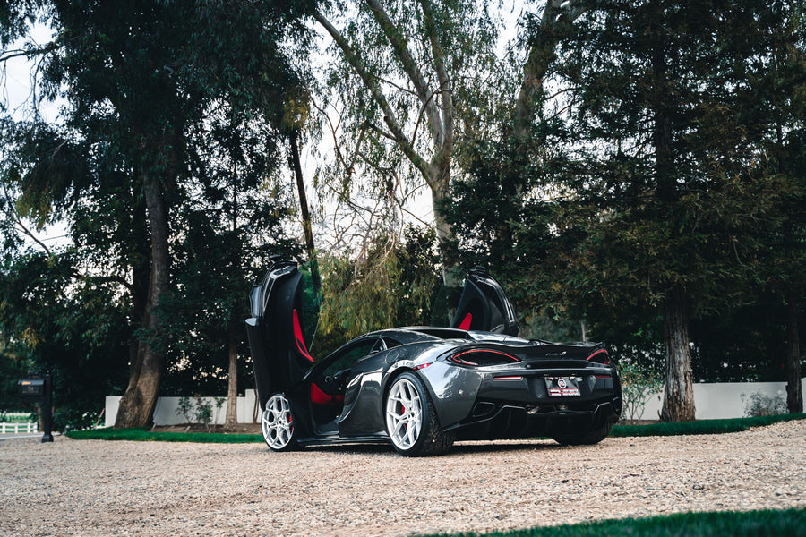 A 2019 McLaren 570s on 20 Inch Blaque Diamond BD-F25 Brushed Silver Wheels