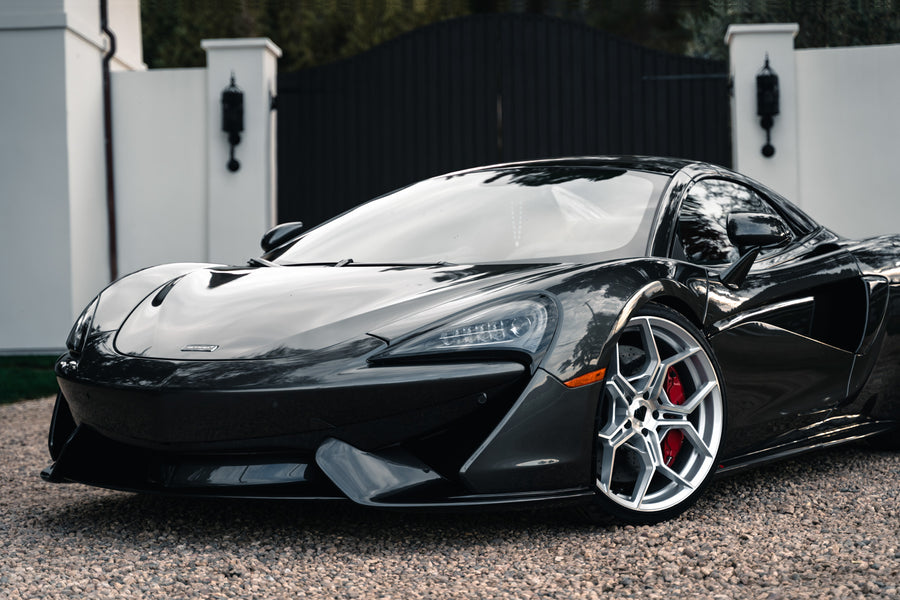 A 2019 McLaren 570s on 20 Inch Blaque Diamond BD-F25 Brushed Silver Wheels