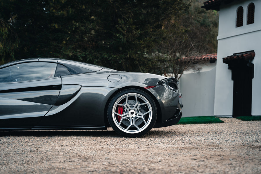 A 2019 McLaren 570s on 20 Inch Blaque Diamond BD-F25 Brushed Silver Wheels