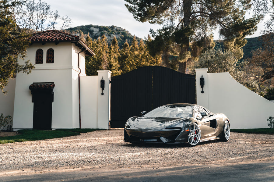 A 2019 McLaren 570s on 20 Inch Blaque Diamond BD-F25 Brushed Silver Wheels
