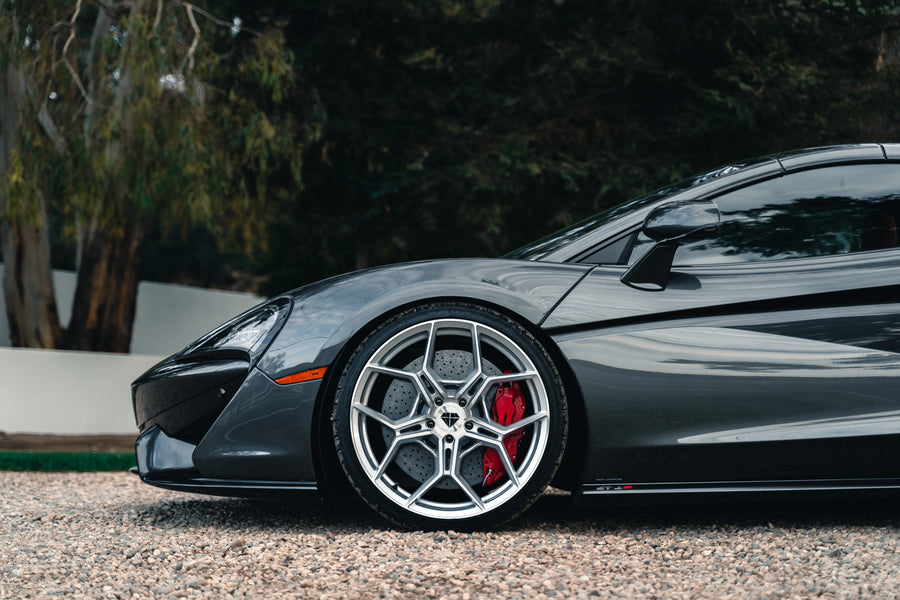 A 2019 McLaren 570s on 20 Inch Blaque Diamond BD-F25 Brushed Silver Wheels