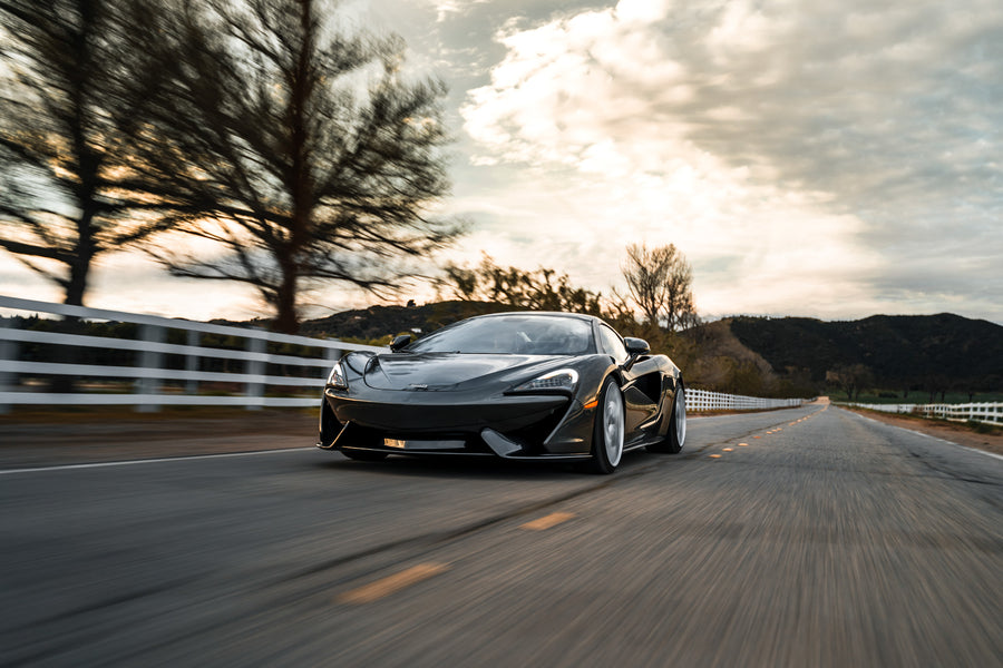 A 2019 McLaren 570s on 20 Inch Blaque Diamond BD-F25 Brushed Silver Wheels