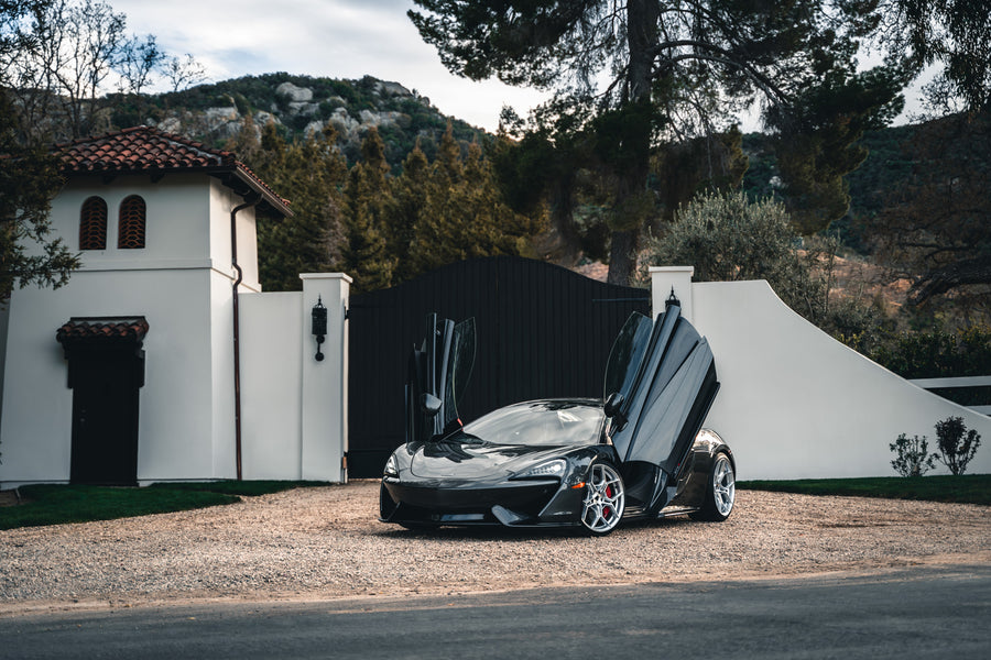 A 2019 McLaren 570s on 20 Inch Blaque Diamond BD-F25 Brushed Silver Wheels