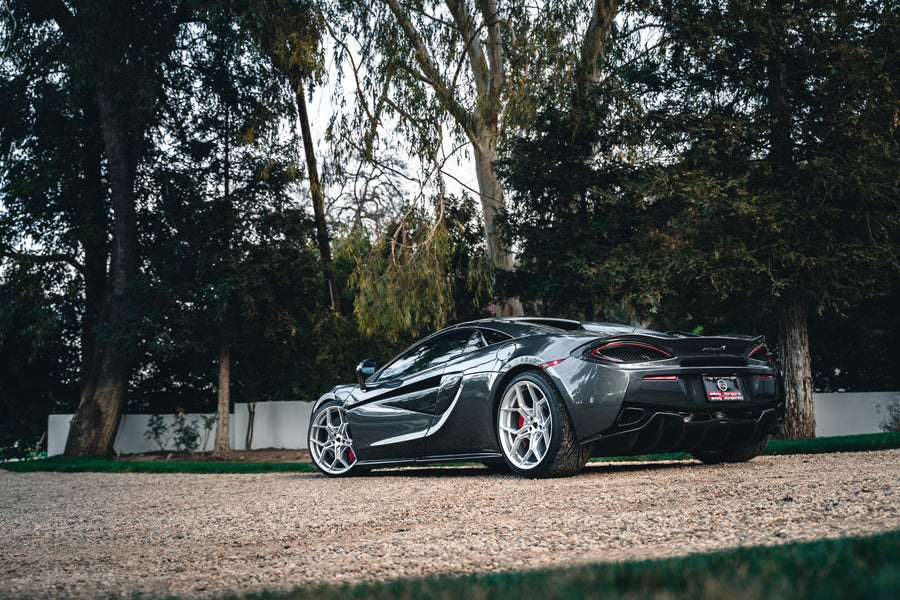 A 2019 McLaren 570s on 20 Inch Blaque Diamond BD-F25 Brushed Silver Wheels