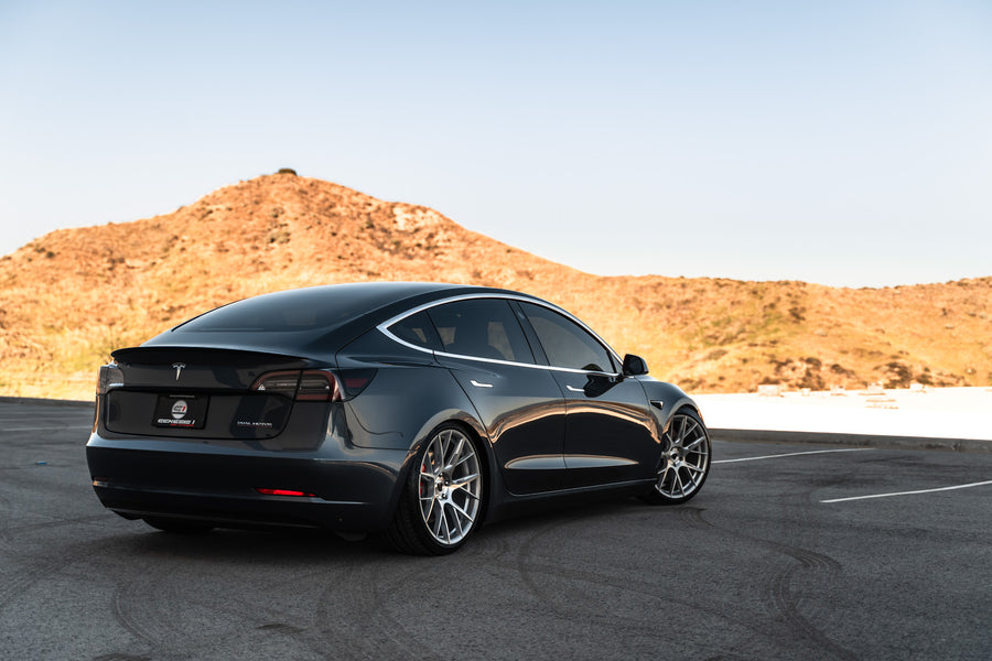 A 2019 Tesla Model 3 on Blaque Diamond BD-F18 Brushed Silver Wheels