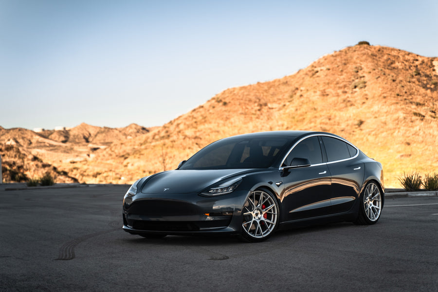 A 2019 Tesla Model 3 on Blaque Diamond BD-F18 Brushed Silver Wheels