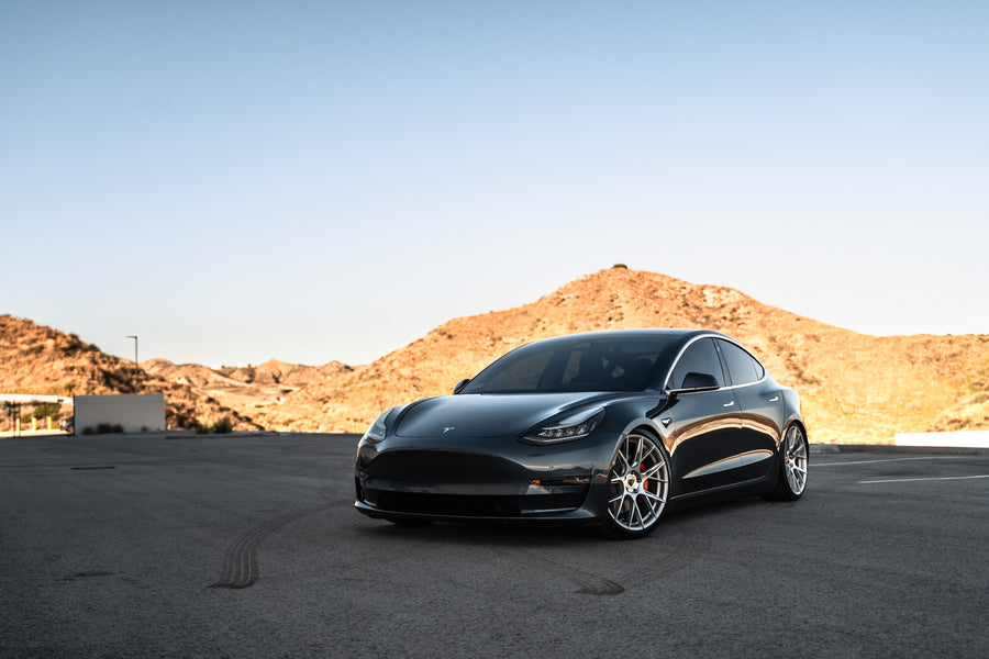 A 2019 Tesla Model 3 on Blaque Diamond BD-F18 Brushed Silver Wheels