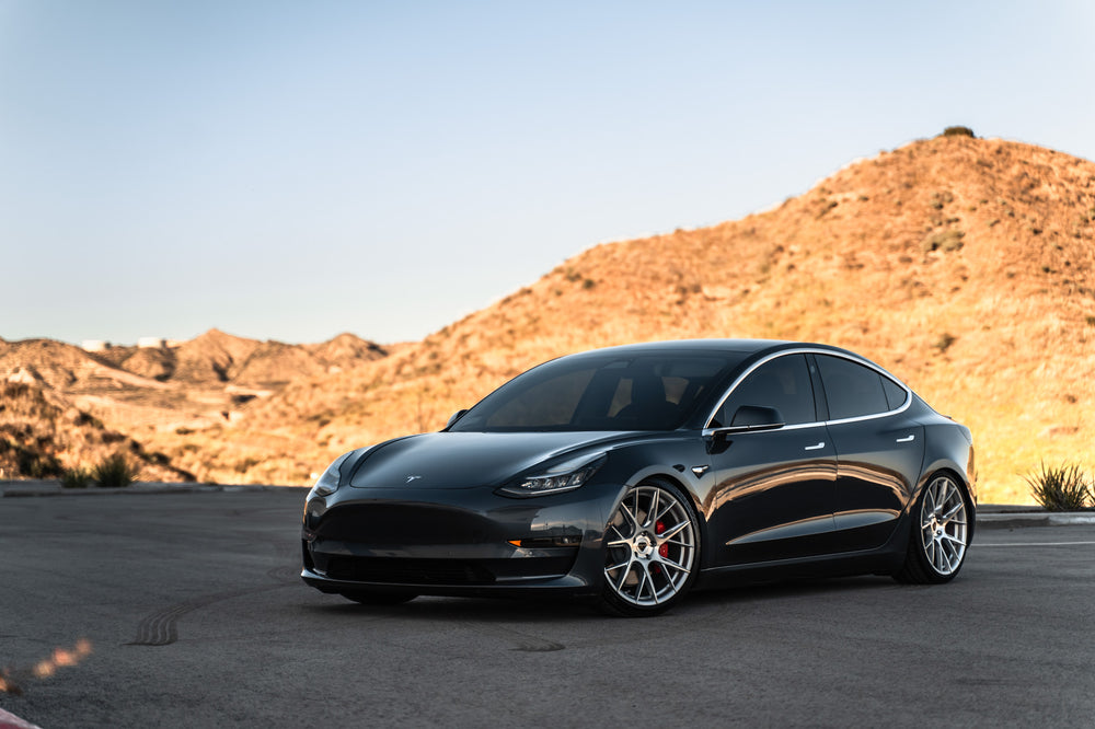 A 2019 Tesla Model 3 on Blaque Diamond BD-F18 Brushed Silver Wheels
