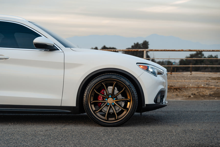 A 2020 Alfa Romeo Stelvio on Blaque Diamond BD-23 Custom Bronze Finish Wheels