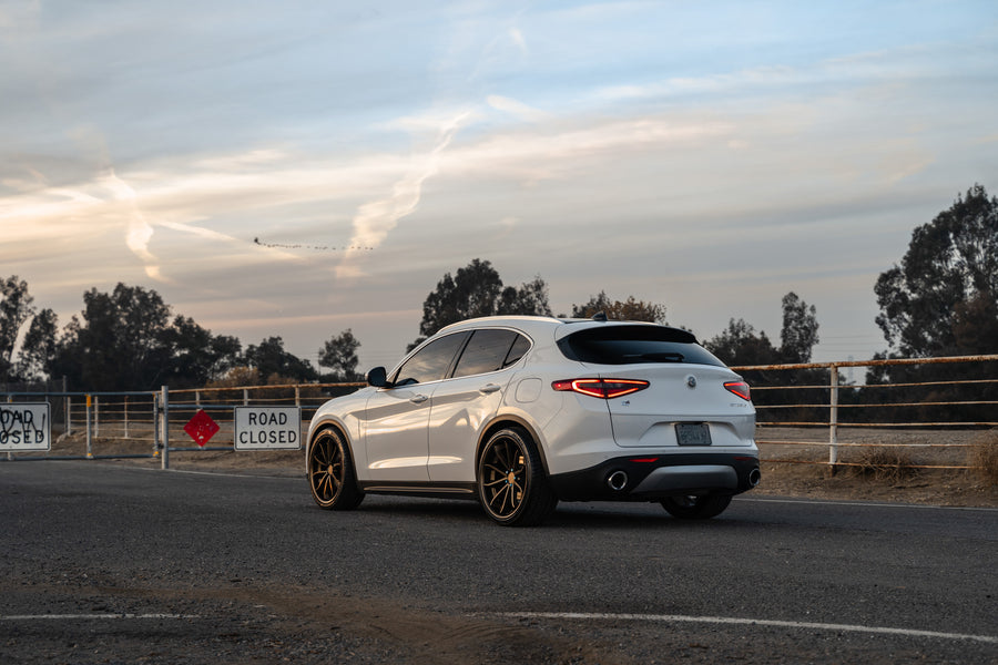 A 2020 Alfa Romeo Stelvio on Blaque Diamond BD-23 Custom Bronze Finish Wheels