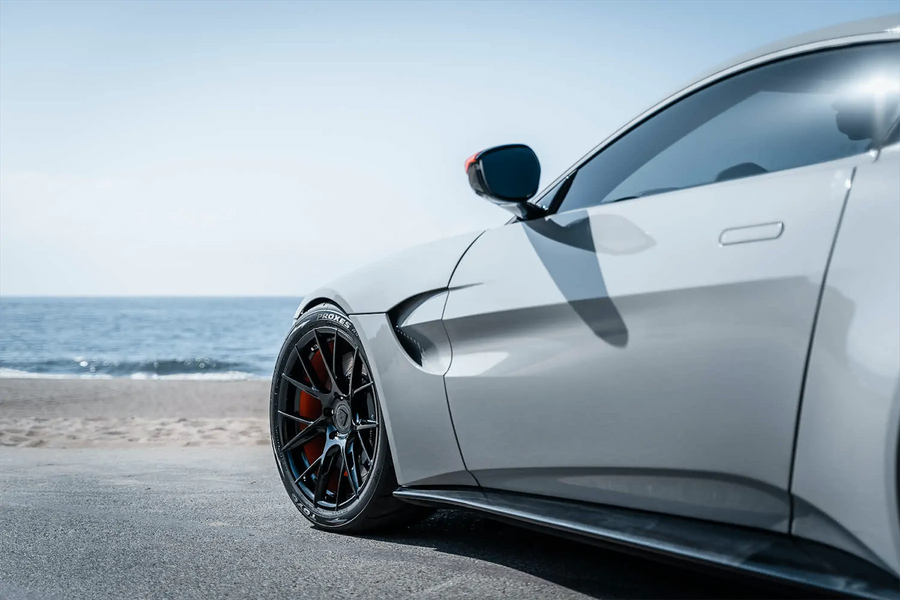 A 2020 Aston Martin Vantage on Blaque Diamond BD-F18 Gloss Black with Orange Barrel Wheels