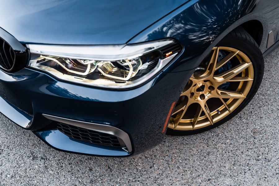 A 2020 BMW M550 on 20 Inch Blaque Diamond BD-F18 Transparent Brass Wheels