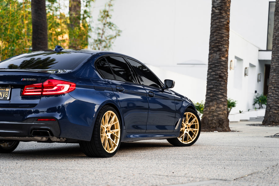 A 2020 BMW M550 on 20 Inch Blaque Diamond BD-F18 Transparent Brass Wheels