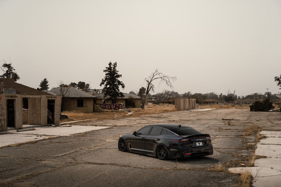 A 2020 Kia Stinger GT AWD on Blaque Diamond BD-F18 Gloss Black Wheels