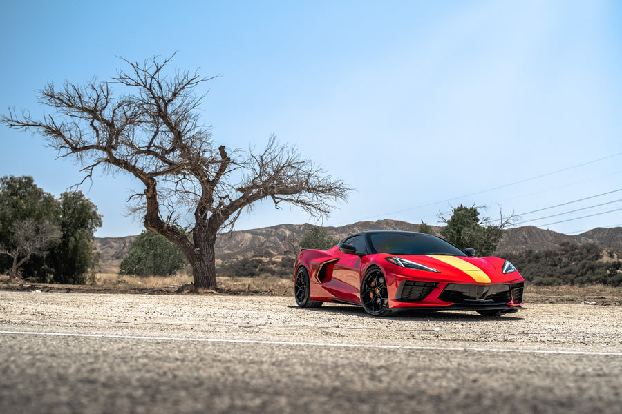 A Red 2021 Chevrolet Corvette C8 on Blaque Diamond BD-F25 Gloss Black Wheels