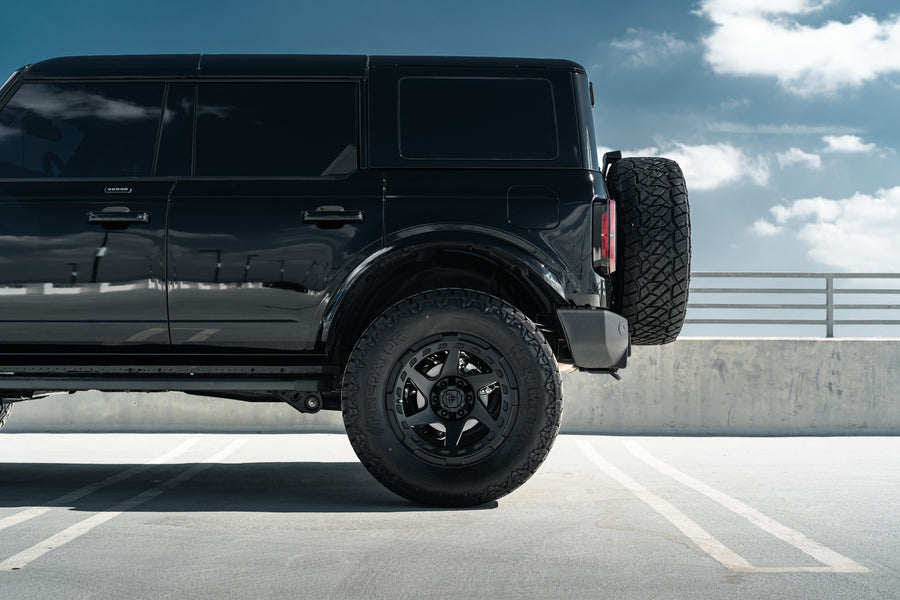 A 2022 Ford Bronco on Blaque Diamond BD-O728 Textured Black Wheels