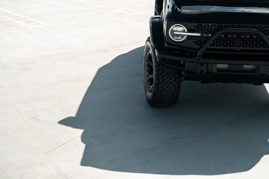 A 2022 Ford Bronco on Blaque Diamond BD-O728 Textured Black Wheels