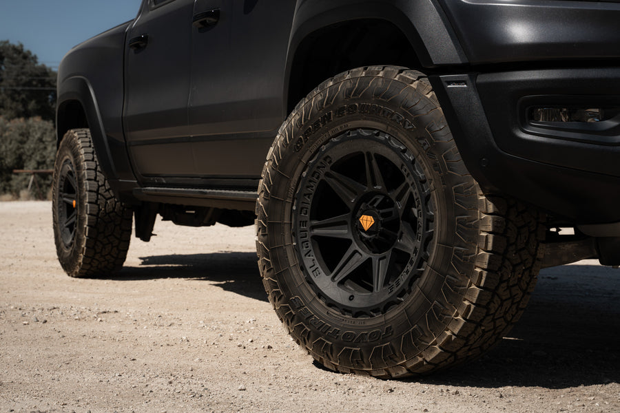 A 2022 Ram 1500 TRX on Blaque Diamond BD-O102 Textured Black Wheels