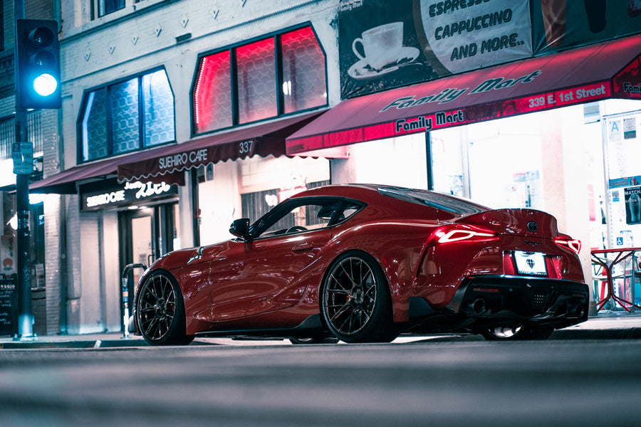 A 2020 Toyota Supra on Blaque Diamond BD-F18 Polished Bronze Little Tokyo Wheels