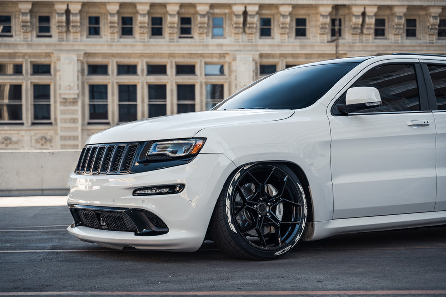 A 2014 Jeep Cherokee SRT8 on Blaque Diamond BD-F25 Gloss Black Wheels