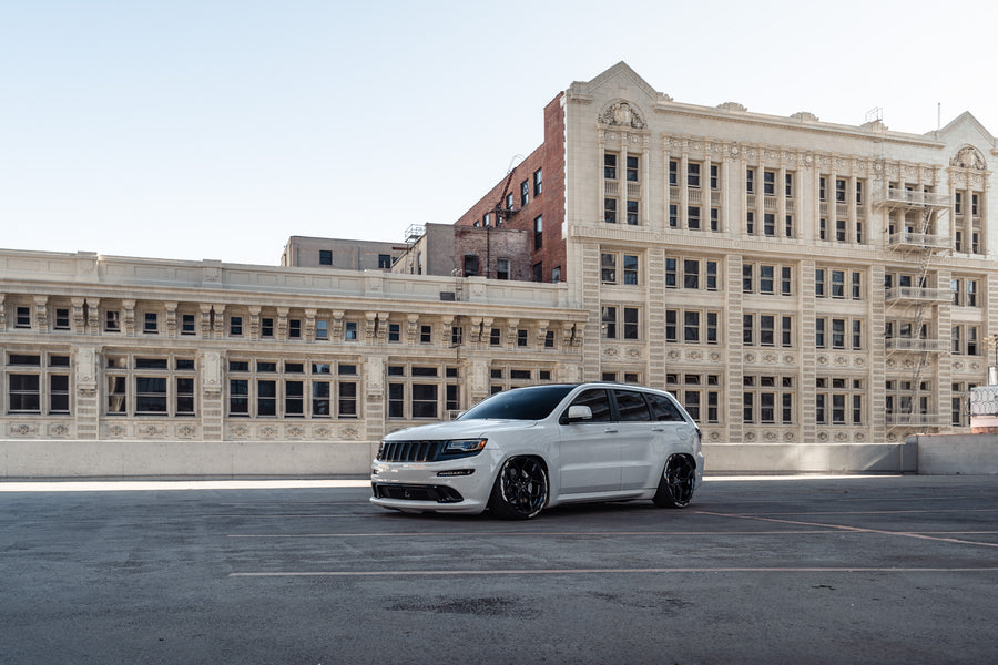 A 2014 Jeep Cherokee SRT8 on Blaque Diamond BD-F25 Gloss Black Wheels