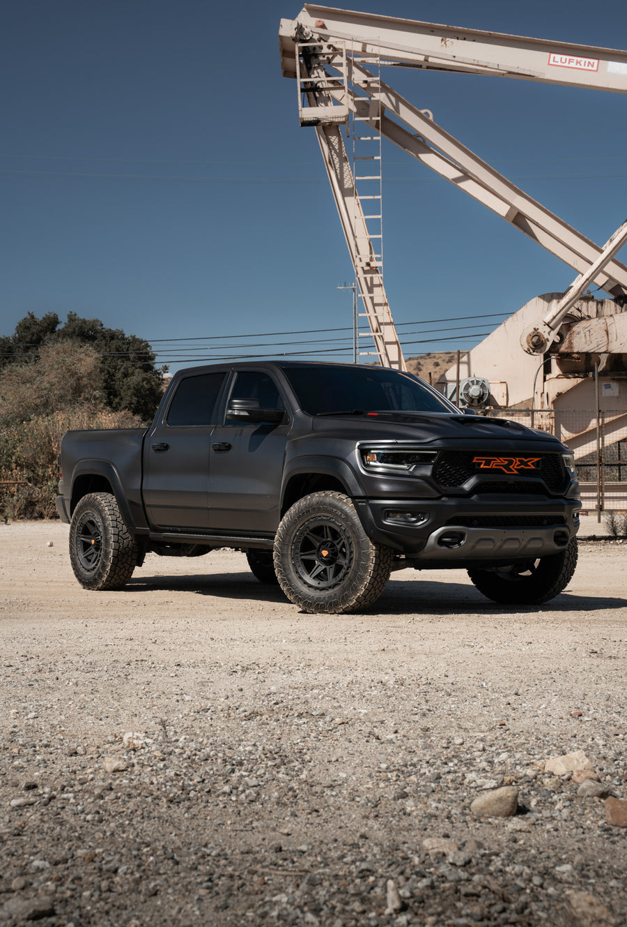 A 2022 Ram 1500 TRX on Blaque Diamond BD-O102 Textured Black Wheels