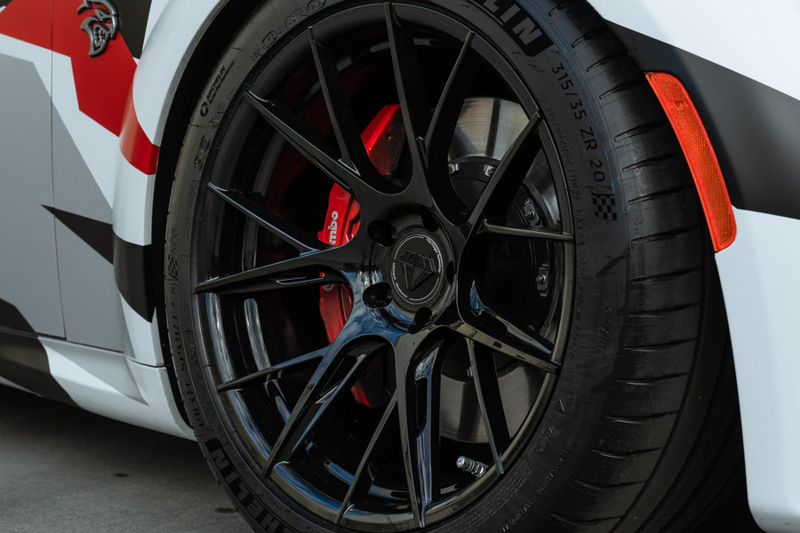 A Dodge Charger Hellcat Widebody on Blaque Diamond BD-F18 Gloss Black Wheels