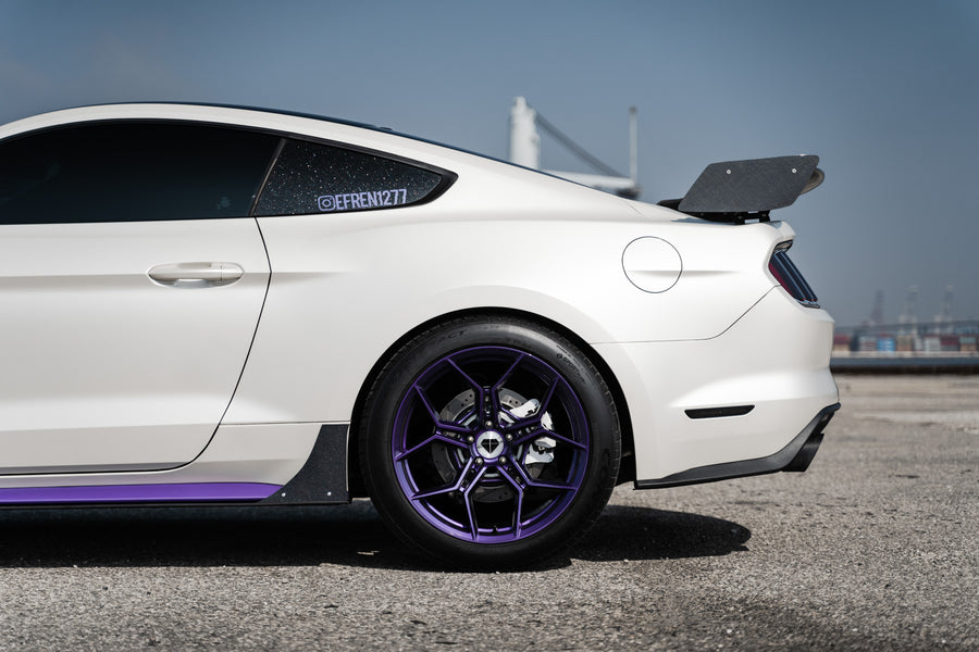 A 2015 Ford Mustang GT on Blaque Diamond BD-F25 Gloss Purple Wheels