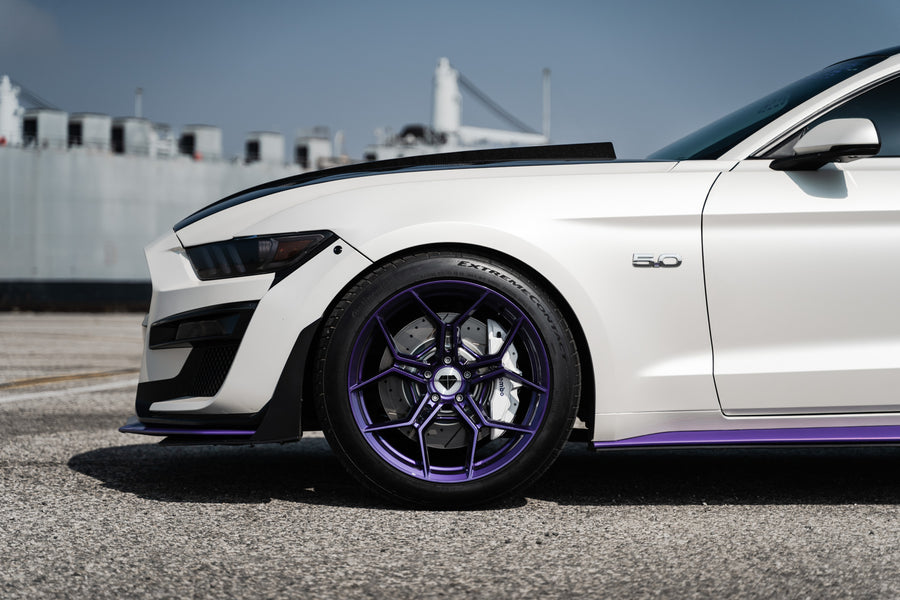 A 2015 Ford Mustang GT on Blaque Diamond BD-F25 Gloss Purple Wheels