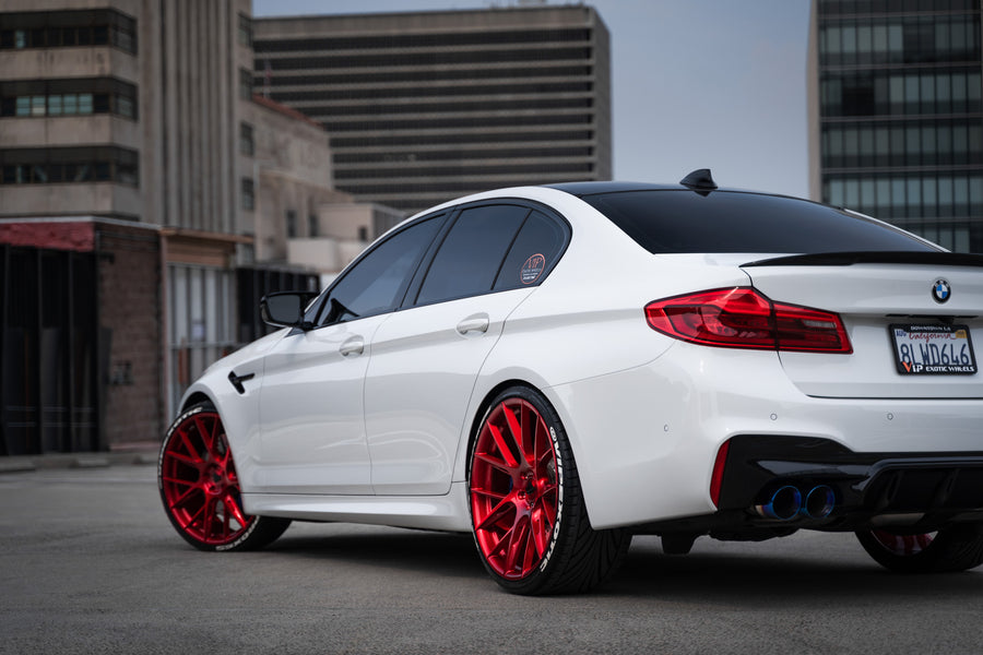 A 2020 BMW M5 Competition on Blaque Diamond BD-F18 Custom Brushed Lollipop Red Wheels