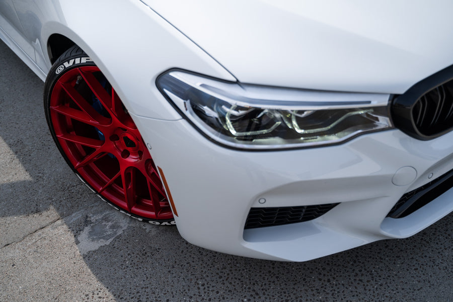 A 2020 BMW M5 Competition on Blaque Diamond BD-F18 Custom Brushed Lollipop Red Wheels