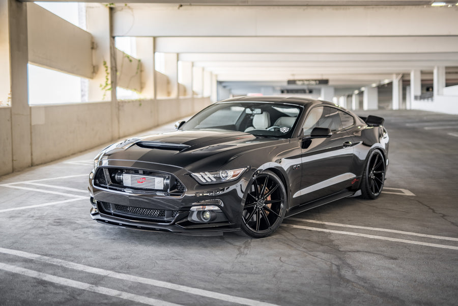 A 2015 Ford Mustang GT Foose Edition on Blaque Diamond BD-11 Gloss Black Staggered Wheels