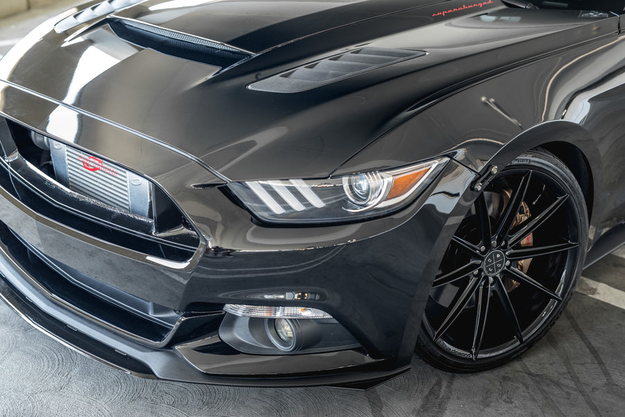 A 2015 Ford Mustang GT Foose Edition on Blaque Diamond BD-11 Gloss Black Staggered Wheels