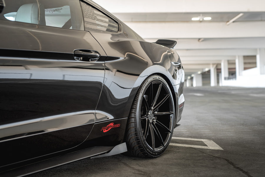A 2015 Ford Mustang GT Foose Edition on Blaque Diamond BD-11 Gloss Black Staggered Wheels
