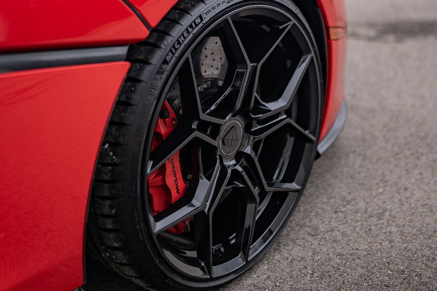 A 2020 McLaren 570s on 20 Inch Blaque Diamond BD-F25 Gloss Black Wheels