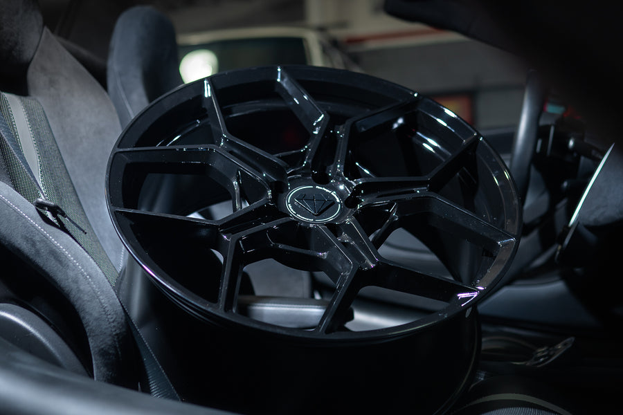 A 2020 McLaren 570s on 20 Inch Blaque Diamond BD-F25 Gloss Black Wheels