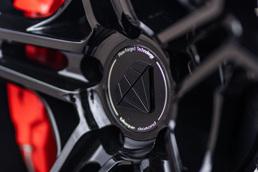 A 2020 McLaren 570s on 20 Inch Blaque Diamond BD-F25 Gloss Black Wheels