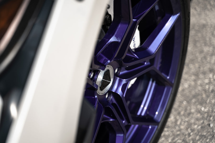 A 2015 Ford Mustang GT on Blaque Diamond BD-F25 Gloss Purple Wheels