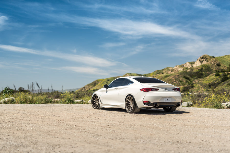 A 2017 Infiniti Q60 on Blaque Diamond BD-11 Antique Bronze Wheels