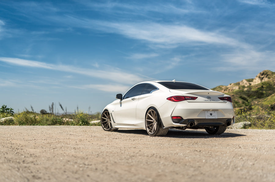 A 2017 Infiniti Q60 on Blaque Diamond BD-11 Antique Bronze Wheels