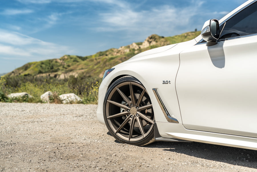 A 2017 Infiniti Q60 on Blaque Diamond BD-11 Antique Bronze Wheels