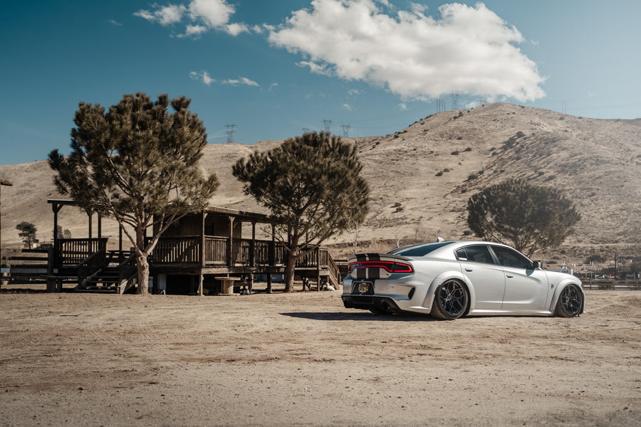 A 2020 Dodge Charger Hellcat Widebody on Blaque Diamond BD-F25 Gloss Black Wheels